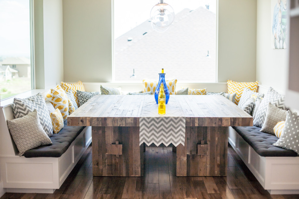 Photo of a contemporary dining room in Salt Lake City with white walls and dark hardwood flooring.