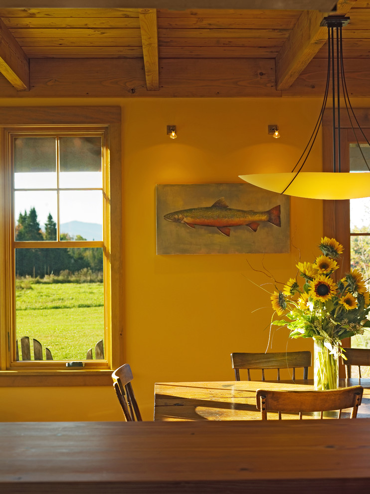 This is an example of a rural dining room in Burlington.