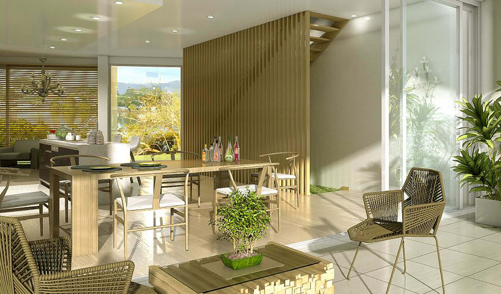 Идея дизайна: большая кухня-столовая в стиле модернизм с желтыми стенами, стандартным камином и фасадом камина из кирпича