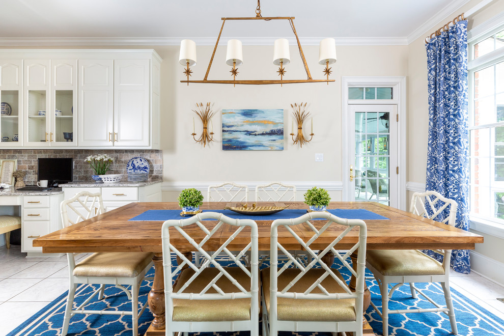 Design ideas for a coastal dining room in Charlotte with blue walls, no fireplace and white floors.