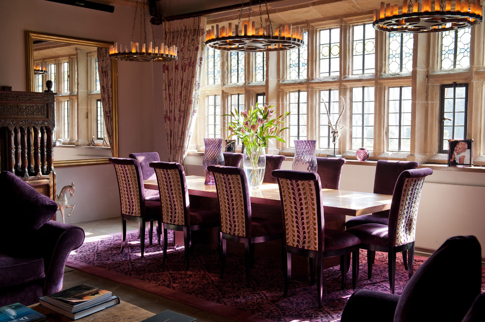 This is an example of a large classic open plan dining room in Other with beige walls.