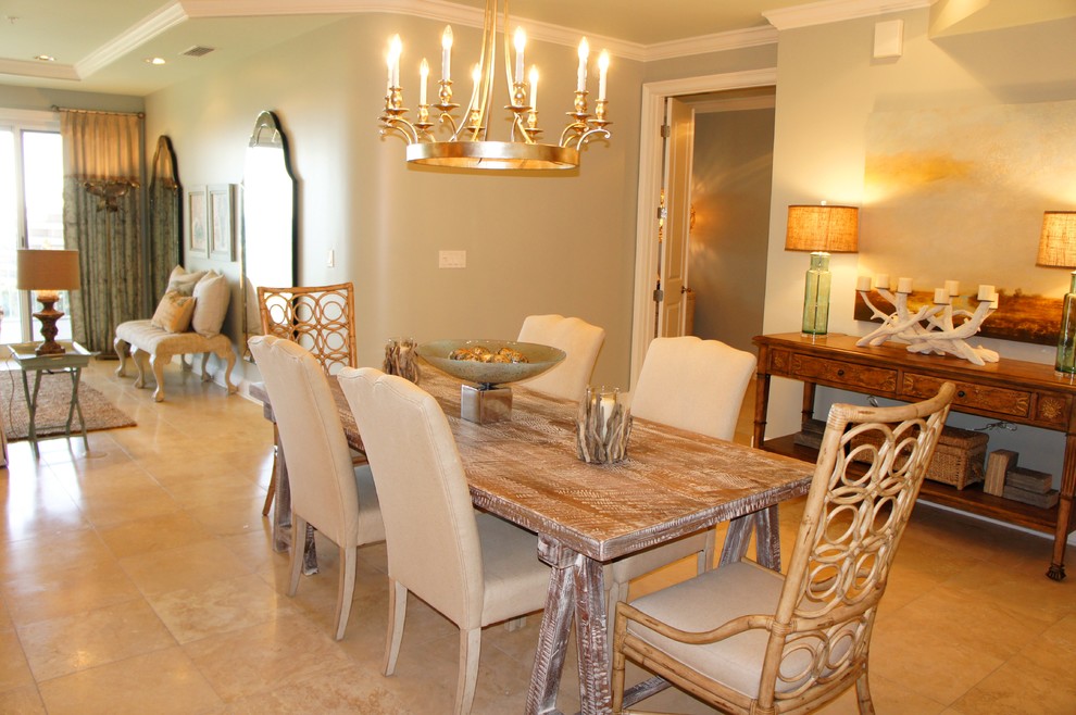 Medium sized coastal open plan dining room in Miami with green walls, travertine flooring and no fireplace.