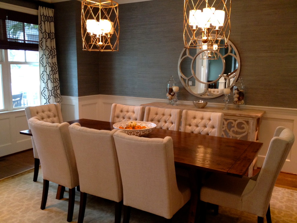 Large elegant medium tone wood floor enclosed dining room photo in DC Metro with brown walls and no fireplace
