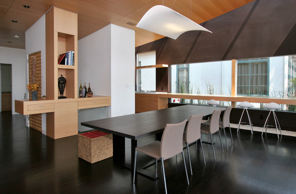 This is an example of a contemporary open plan dining room in San Francisco.