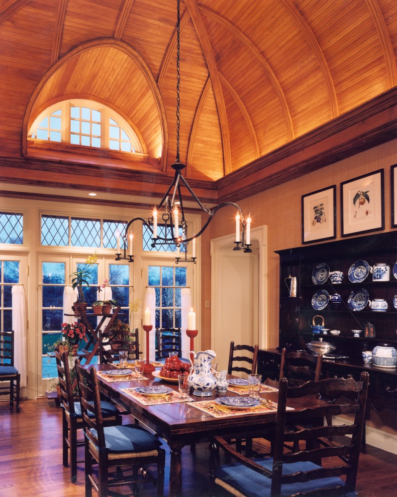 This is an example of a classic dining room in Philadelphia with medium hardwood flooring.