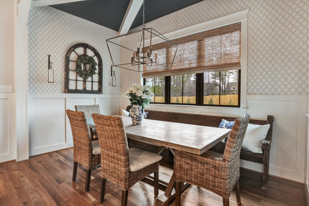 Country dining room in Richmond with grey walls, medium hardwood flooring, no fireplace and brown floors.