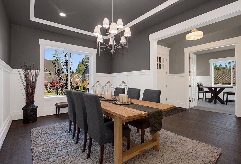 Inspiration for a mid-sized craftsman dark wood floor enclosed dining room remodel in Seattle with gray walls and no fireplace