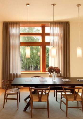 Dining room - mid-sized modern brown floor dining room idea in Seattle with beige walls and no fireplace