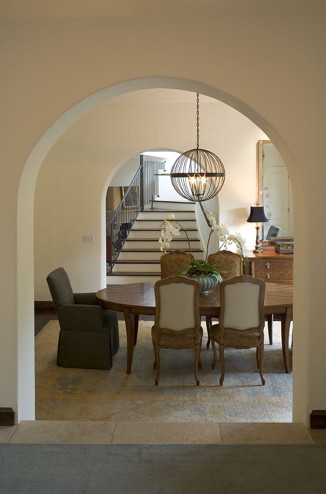 Elegant dark wood floor dining room photo in Austin with beige walls
