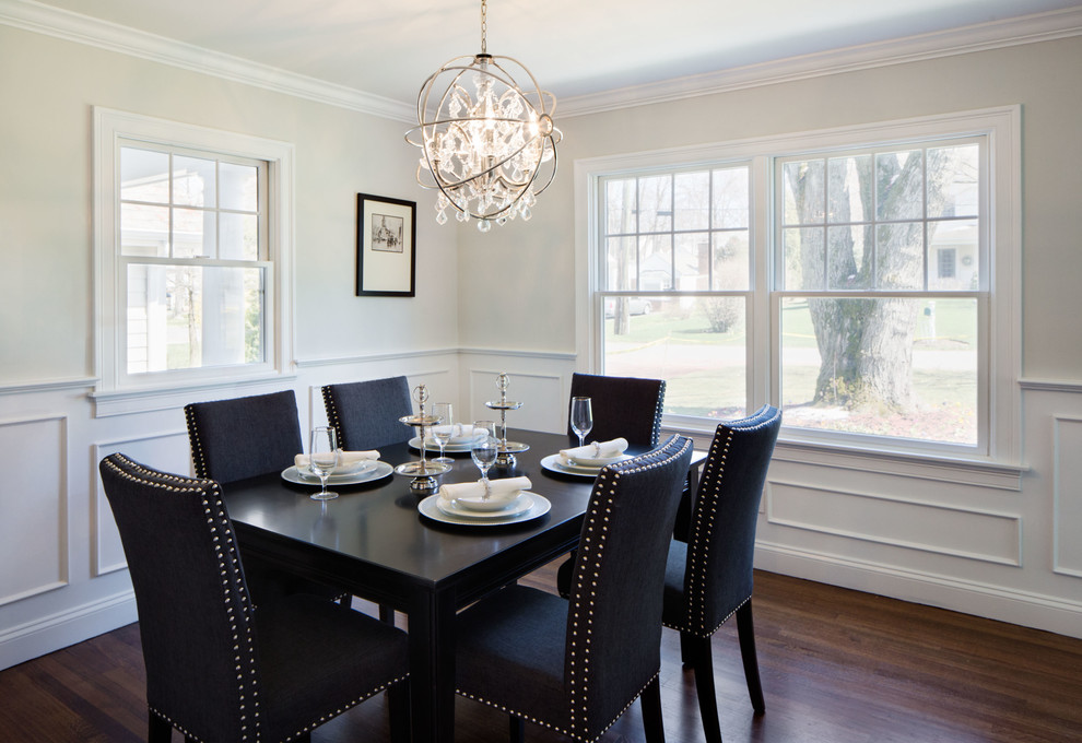 Inspiration for a mid-sized transitional dark wood floor enclosed dining room remodel in New York