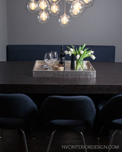 Example of a trendy dining room design in New York