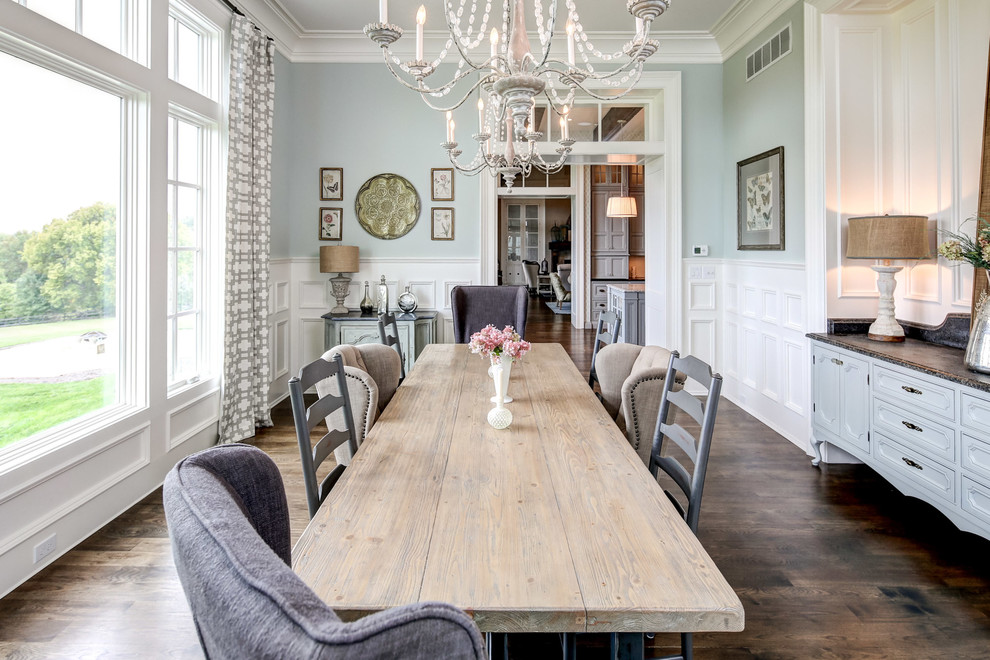 Enclosed dining room - french country dark wood floor enclosed dining room idea in Louisville with blue walls and no fireplace