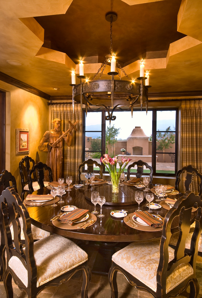 Example of a tuscan dining room design in Phoenix