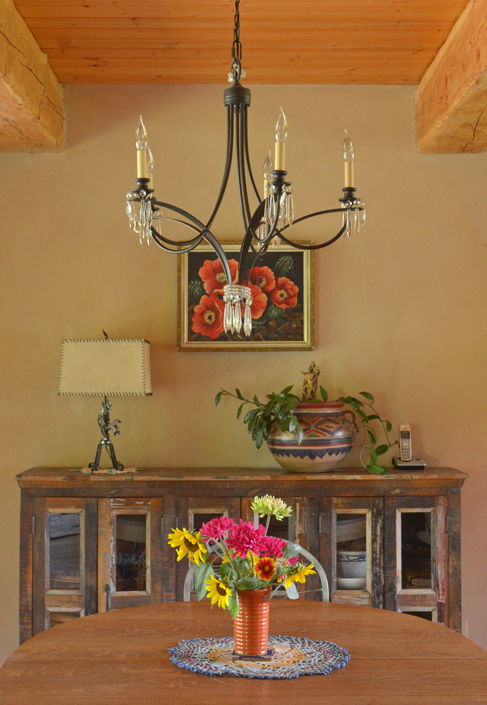Example of a mountain style dining room design in Boise