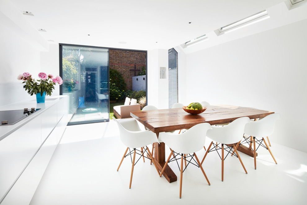Inspiration for a medium sized contemporary kitchen/dining room in London with white floors.