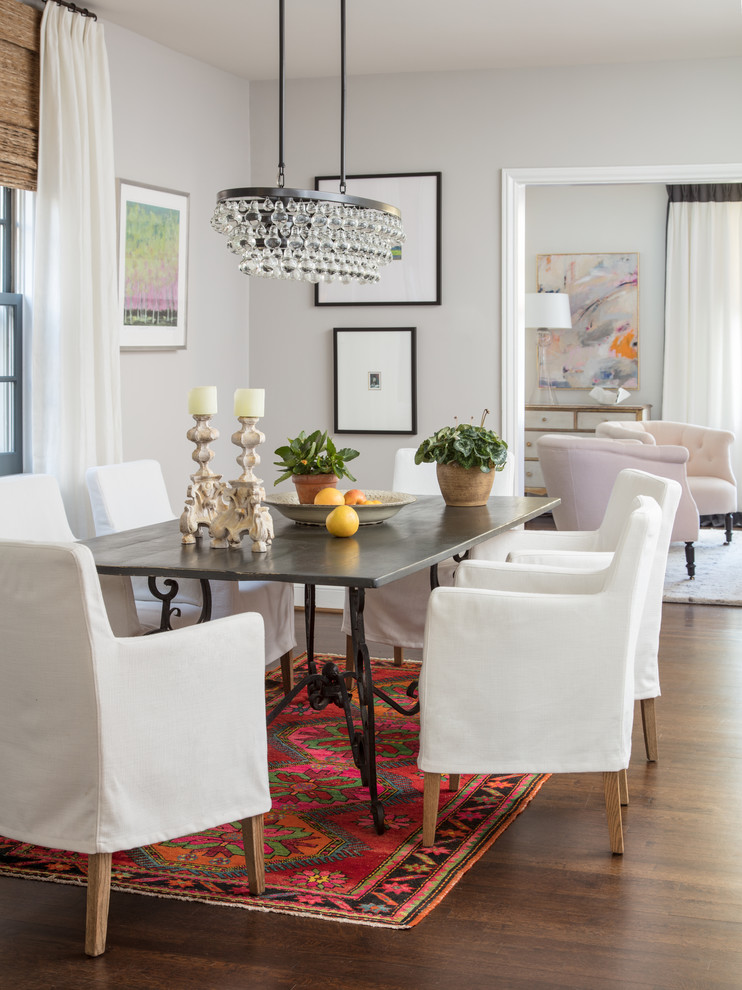 Design ideas for a medium sized classic dining room in Richmond with grey walls, medium hardwood flooring, brown floors and feature lighting.