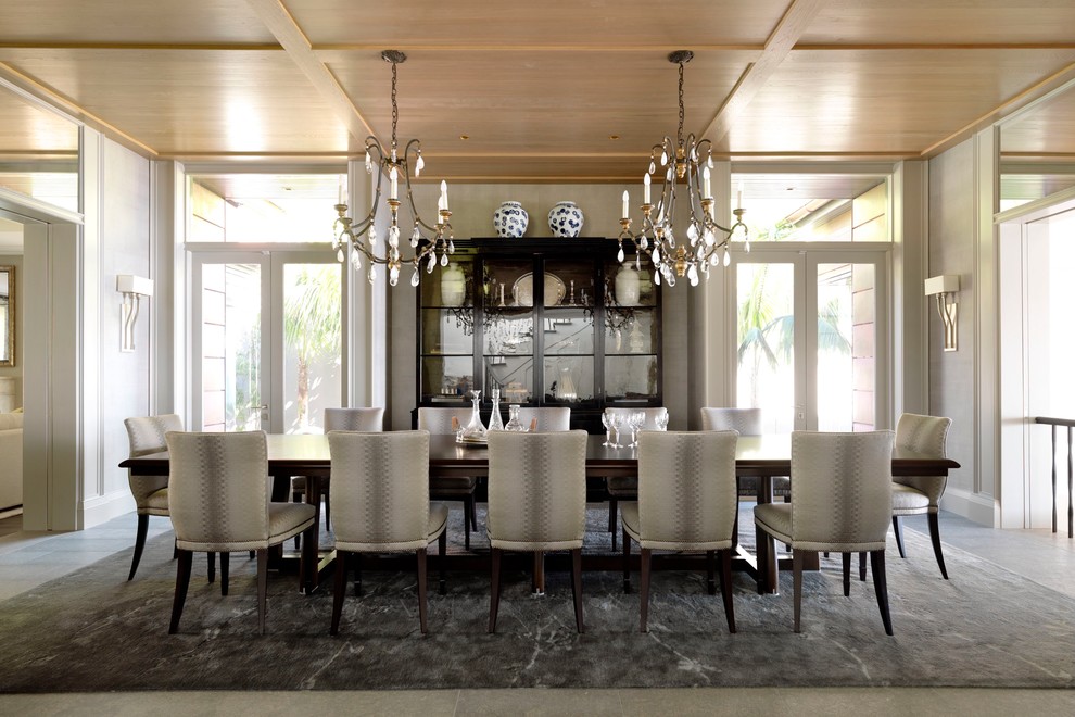 Dining room - large transitional porcelain tile dining room idea in Sydney with gray walls