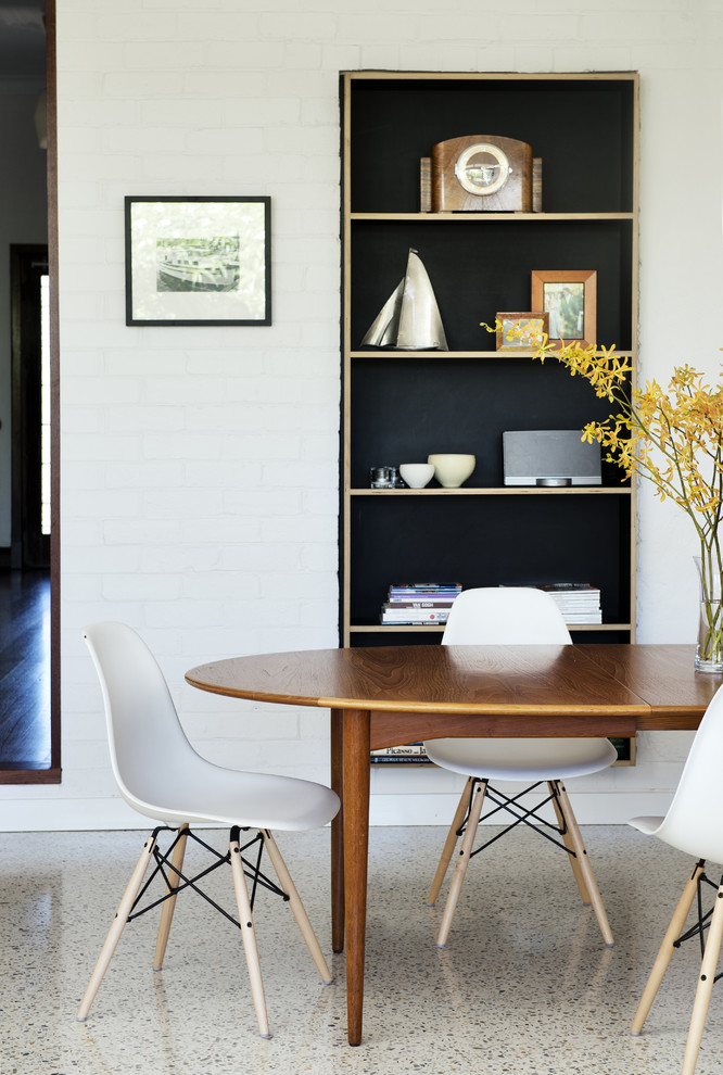 Photo of a contemporary dining room in Perth with white walls.
