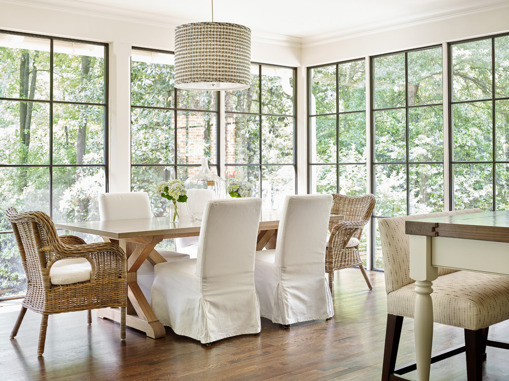 Inspiration for a timeless dark wood floor dining room remodel in Atlanta with beige walls