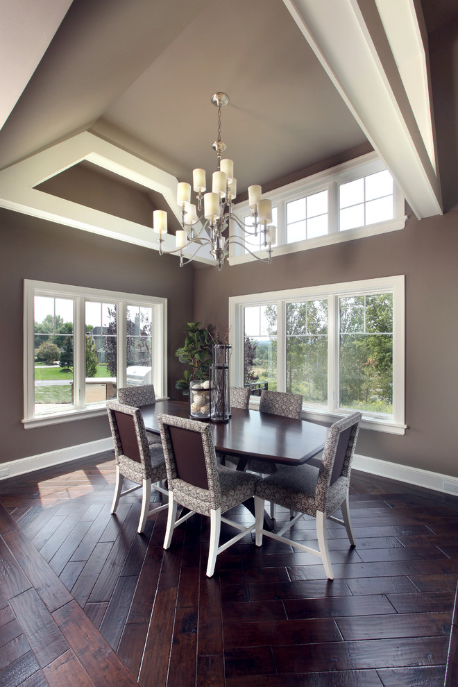 Design ideas for a large traditional open plan dining room in Grand Rapids with grey walls, dark hardwood flooring and no fireplace.