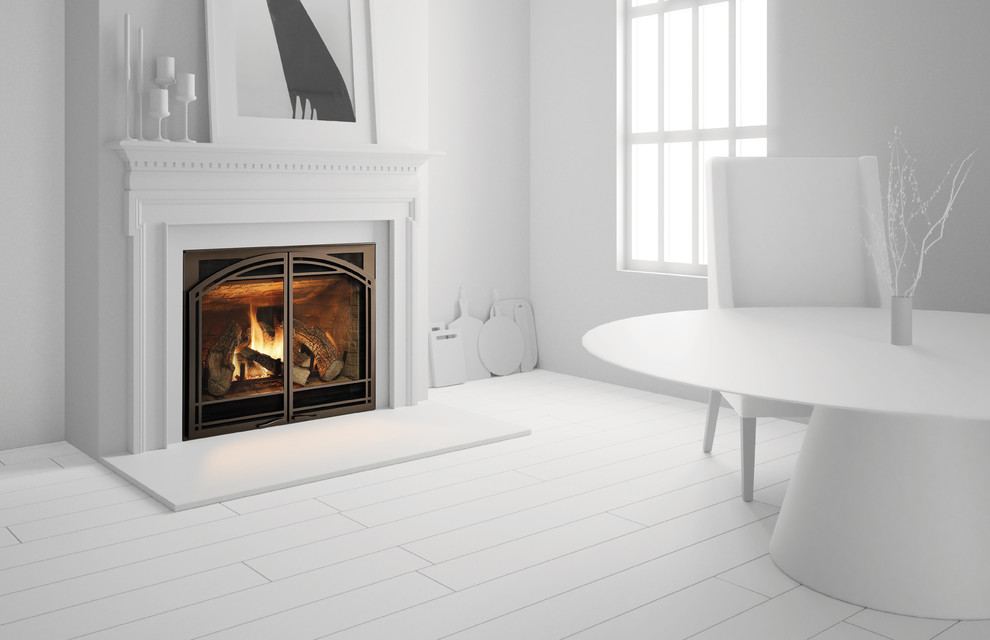 ポートランドにあるトランジショナルスタイルのおしゃれなダイニング (白い壁、標準型暖炉、木材の暖炉まわり、白い床) の写真