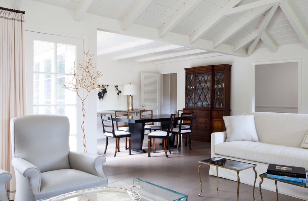 Elegant medium tone wood floor dining room photo in San Francisco with white walls
