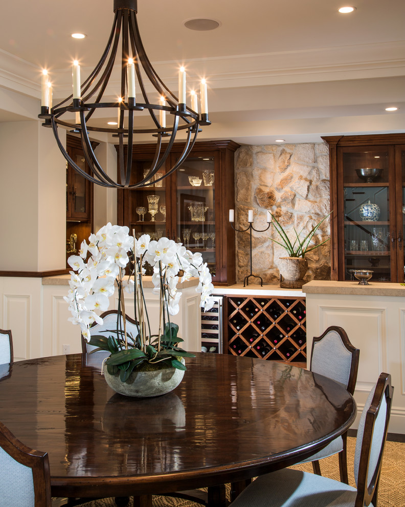 Photo of a large traditional open plan dining room in Orange County with grey walls, dark hardwood flooring, no fireplace and brown floors.