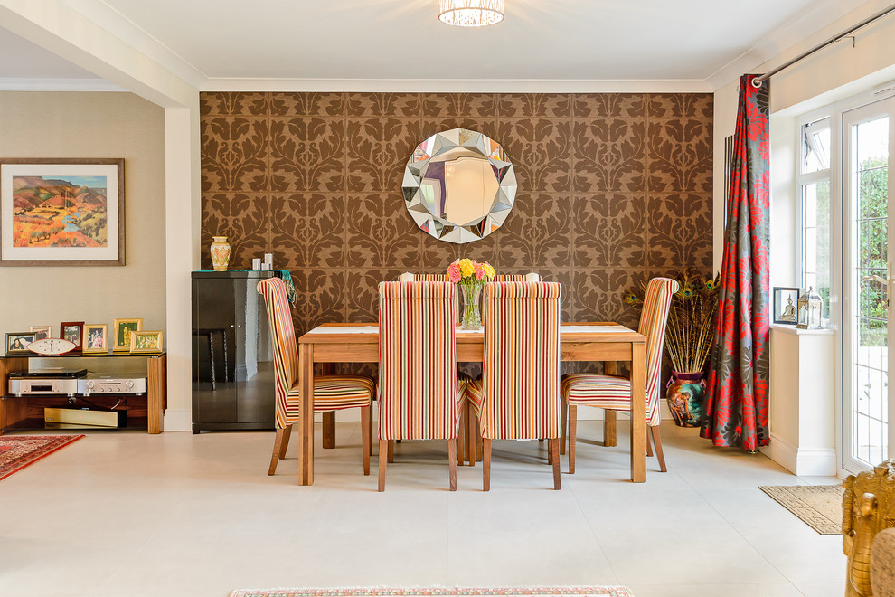 Inspiration for a medium sized traditional open plan dining room in Hertfordshire with multi-coloured walls and beige floors.