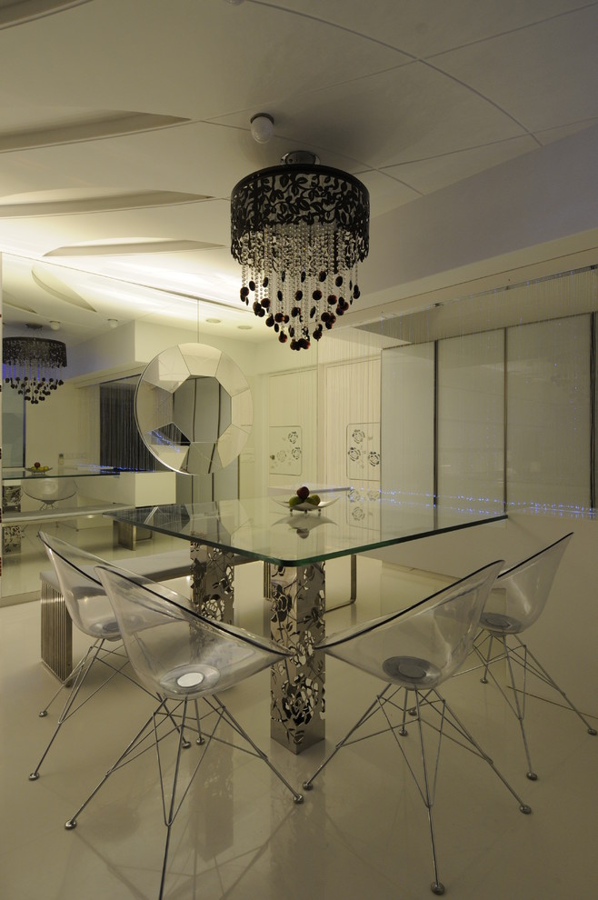 Inspiration for a contemporary dining room remodel in Mumbai
