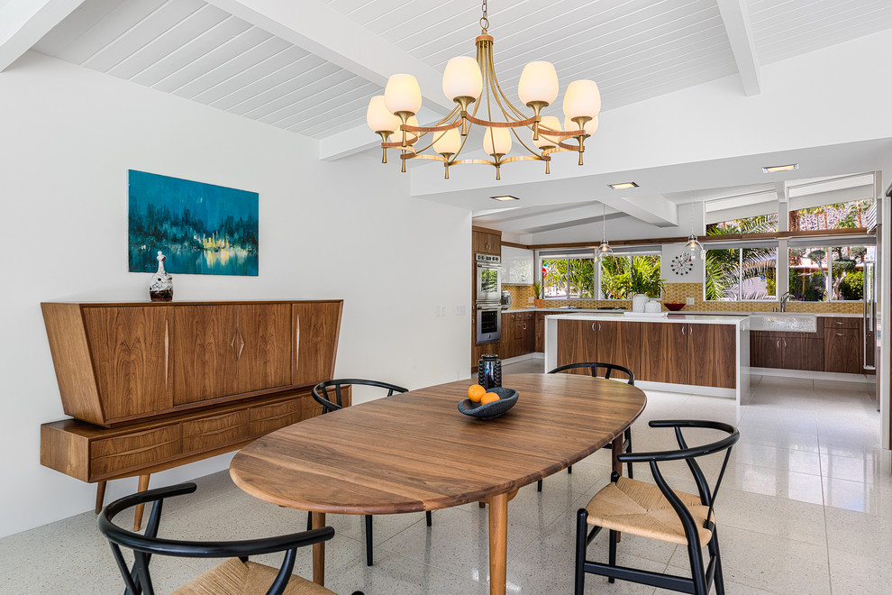 Idee per una sala da pranzo aperta verso la cucina minimalista di medie dimensioni con pareti bianche