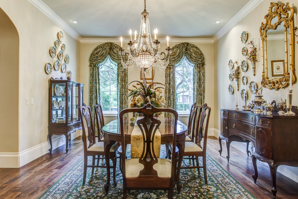 Medium sized traditional dining room in Other with beige walls, medium hardwood flooring and feature lighting.