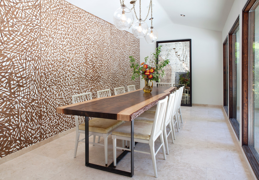 Eclectic enclosed dining room in San Francisco with white walls.