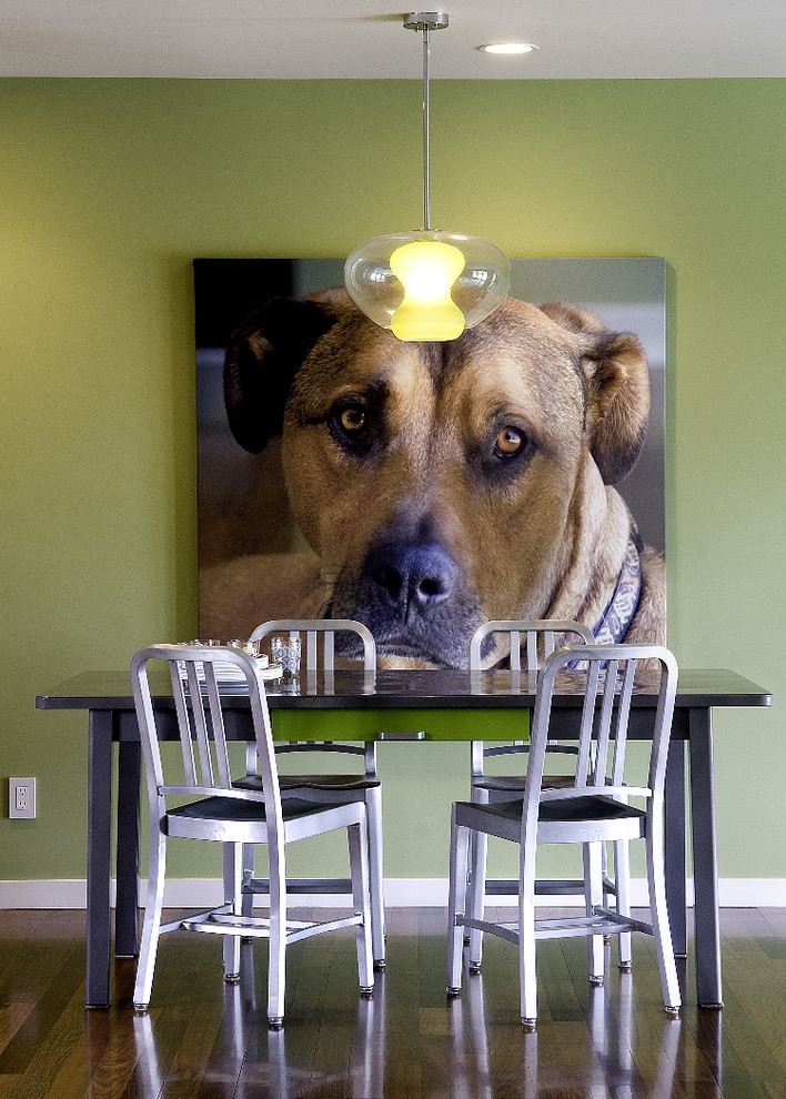 Minimalist dark wood floor dining room photo in San Francisco with green walls