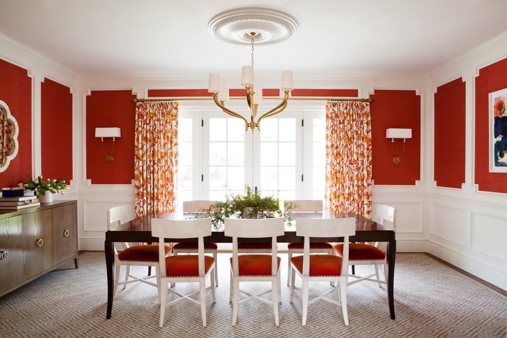 Transitional dining room photo in San Francisco with red walls