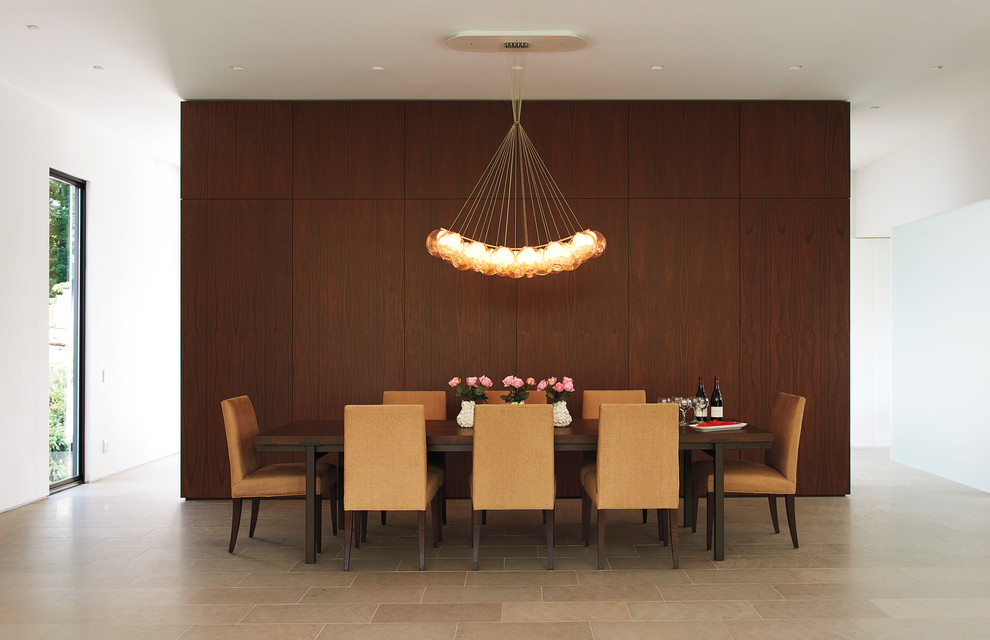 Idée de décoration pour une salle à manger minimaliste avec un mur blanc et aucune cheminée.