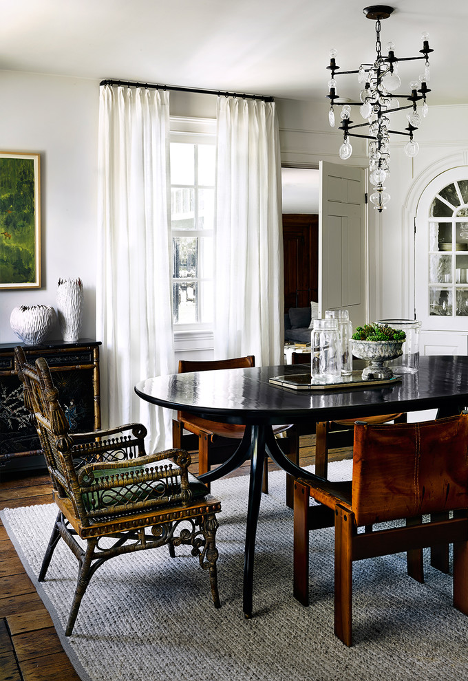 Design ideas for a classic dining room in Chicago with white walls and medium hardwood flooring.