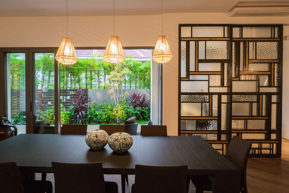 Inspiration for a modern dining room in Singapore.