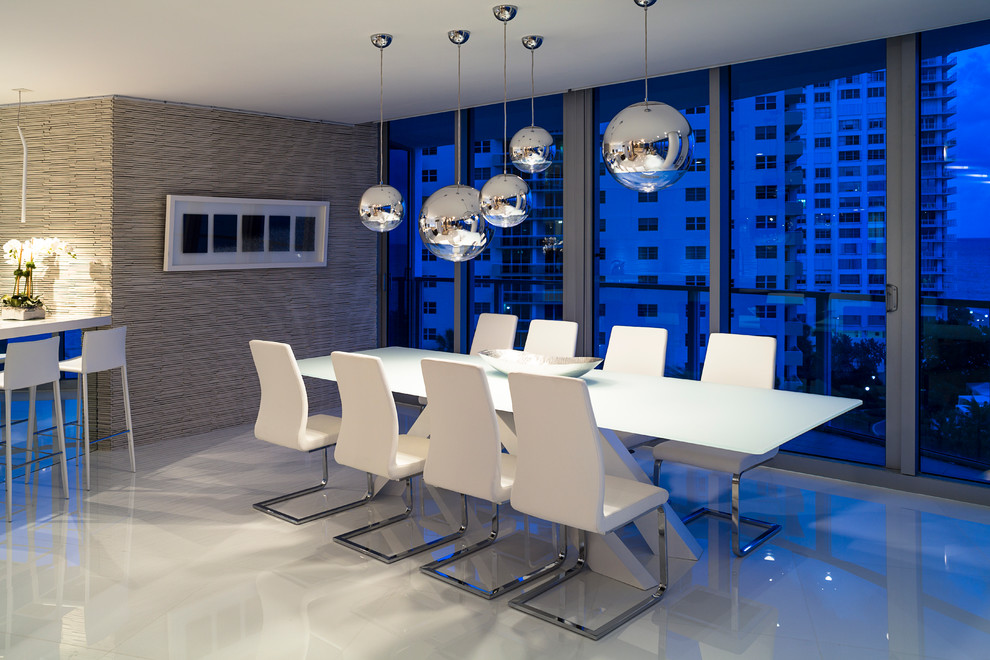 This is an example of a contemporary kitchen/dining room in Miami.
