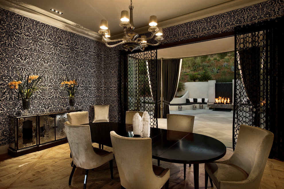 Inspiration for a mid-century modern medium tone wood floor dining room remodel in Santa Barbara