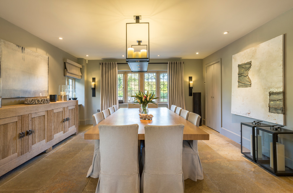 This is an example of a farmhouse dining room in Gloucestershire.