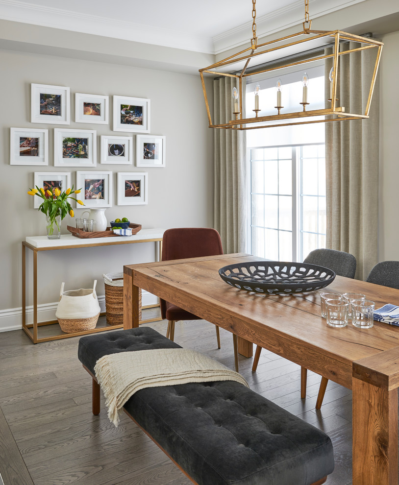 Inspiration for a mid-sized transitional dark wood floor and brown floor dining room remodel in Toronto with gray walls and no fireplace