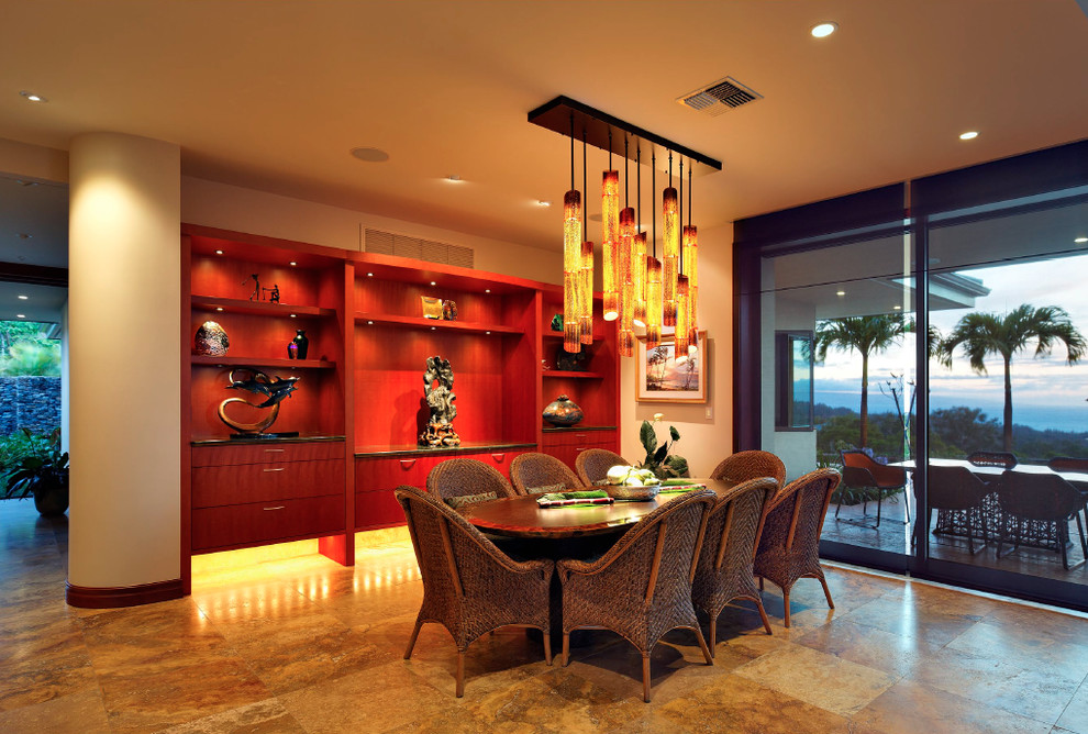 Example of an island style dining room design in Hawaii