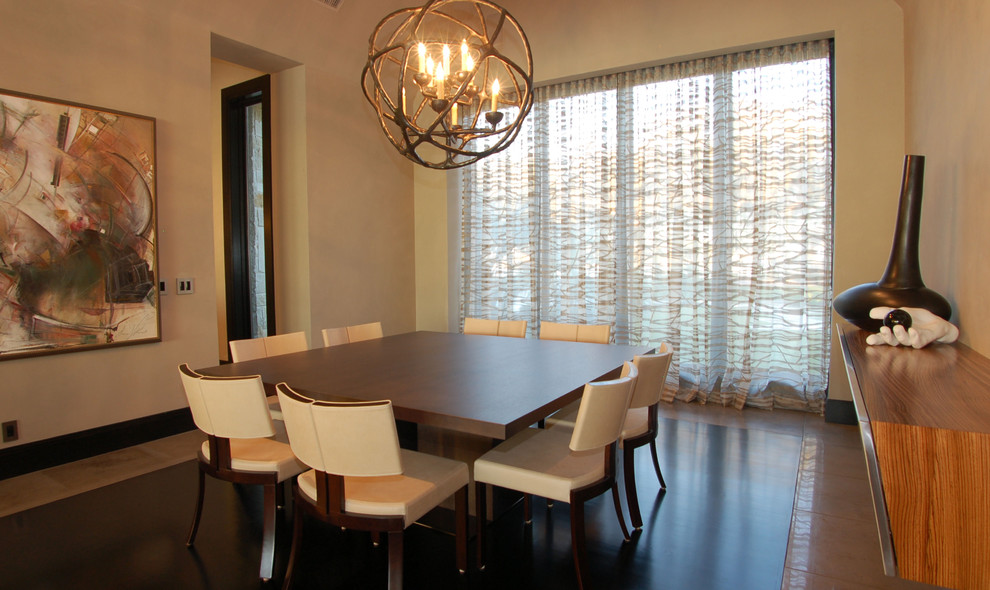 Inspiration for a contemporary dining room in Austin with beige walls.