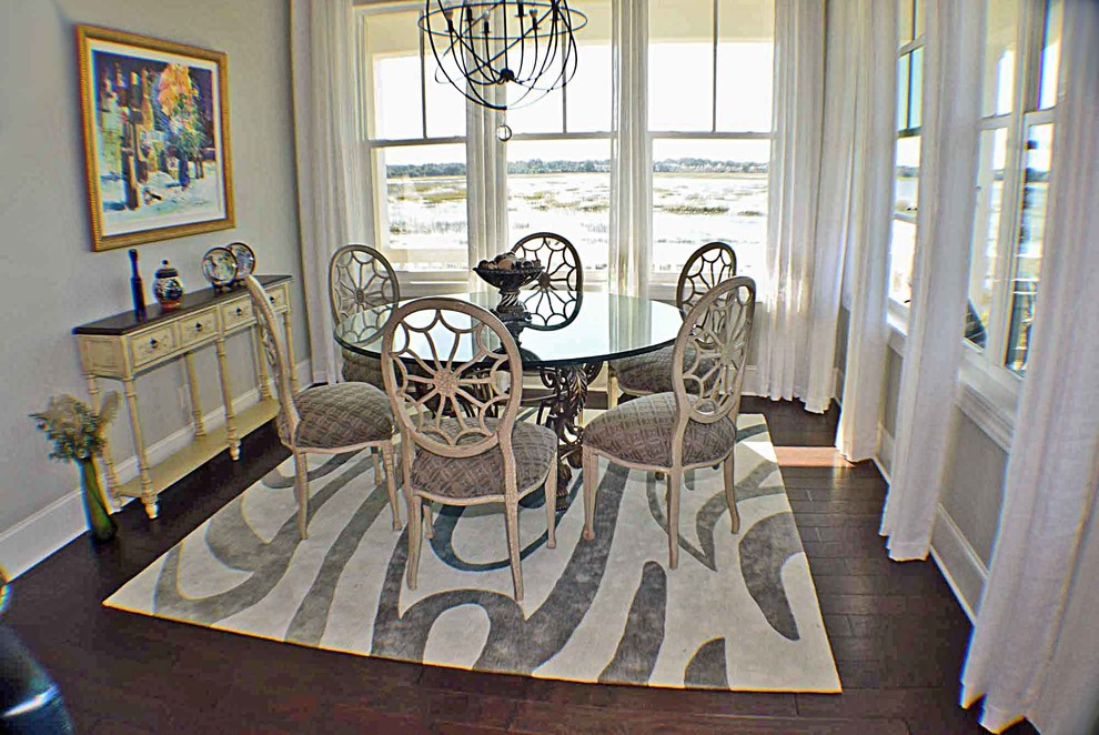 This is an example of a coastal dining room in Charleston.