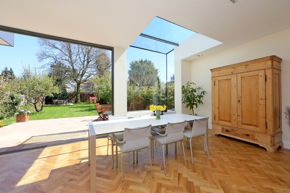 Design ideas for a large contemporary dining room in London.