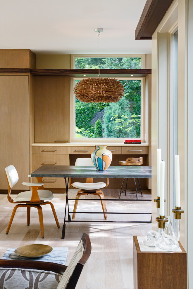 Inspiration for a contemporary light wood floor dining room remodel in DC Metro