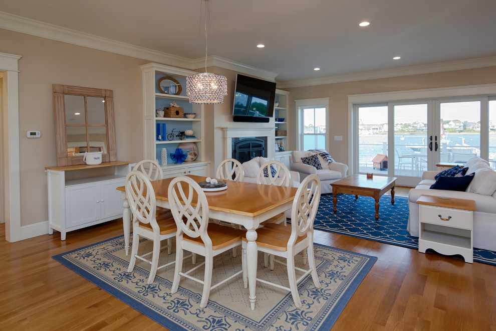 Medium sized nautical open plan dining room in Boston with beige walls.