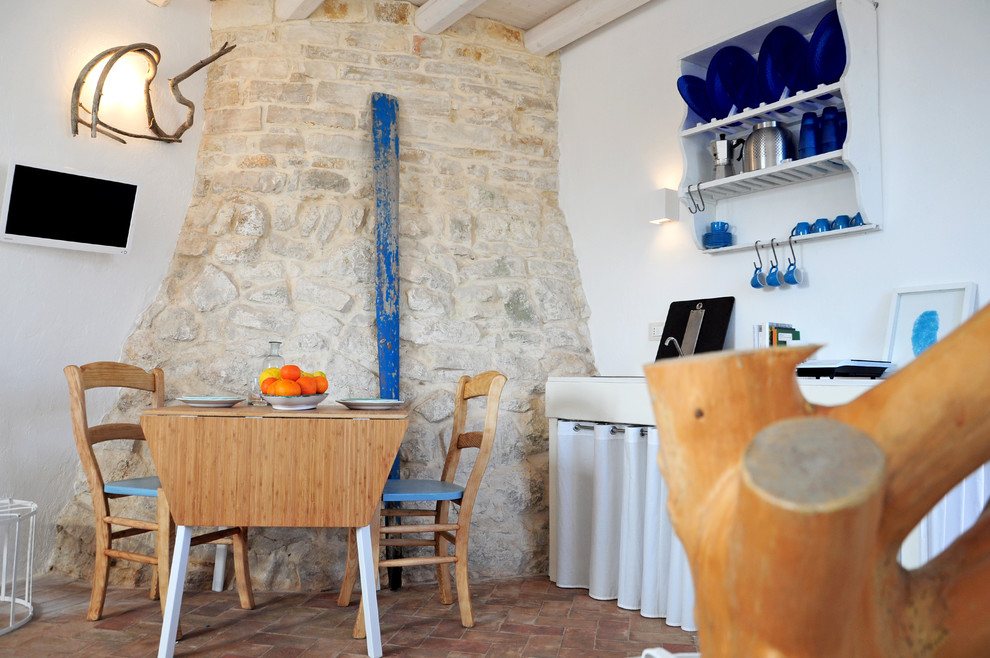This is an example of a mediterranean dining room in Bari.