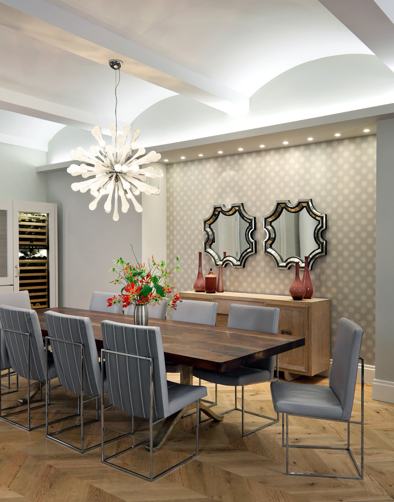 Inspiration for a contemporary dining room in New York with grey walls and medium hardwood flooring.