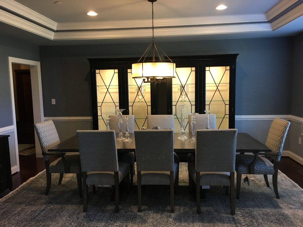 Inspiration for a large classic enclosed dining room in Baltimore with grey walls, dark hardwood flooring and no fireplace.